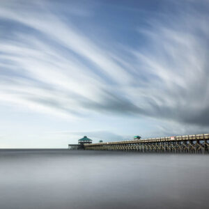 Long exposure photograph of a the Folly Beach Pier before the tear down, South Carolina, before sunset hours, by Ivo Kerssemakers